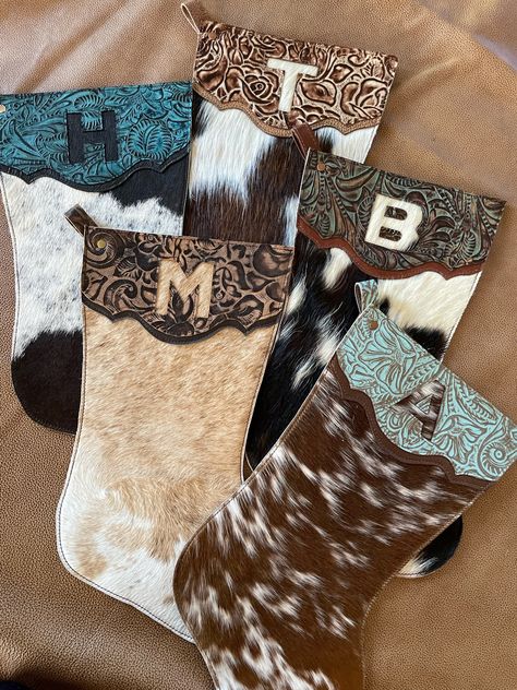 Cow Print Christmas Stocking, Western Sitting Room, Cowboy Boot Stockings Western Christmas, Western Christmas Present Ideas, Cowhide Christmas Stocking, Christmas Western Decorations, Country Western Christmas Tree Ideas, Cowhide Home Decor, Cowhide Christmas Decor