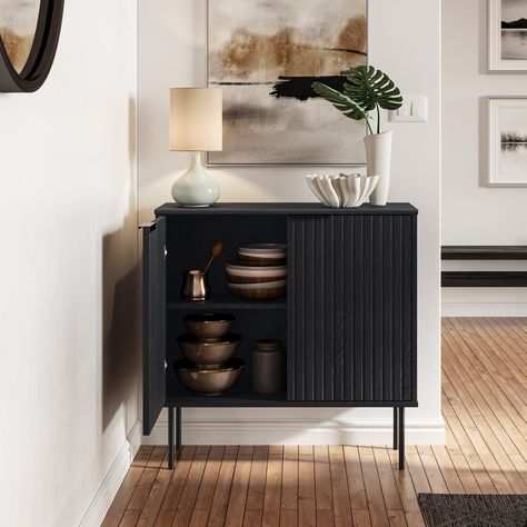 Step into a space where timeless elegance meets modern practicality with the Lysander Compact Sideboard Buffet. Fluted design made of engineered wood paired with metal legs. Small Buffet Cabinet, Apartment Bar, Chic Wall Art, Small Sideboard, Black Sideboard, Cabinet Bed, Mdf Frame, Buffet Cabinet, Black Cabinets