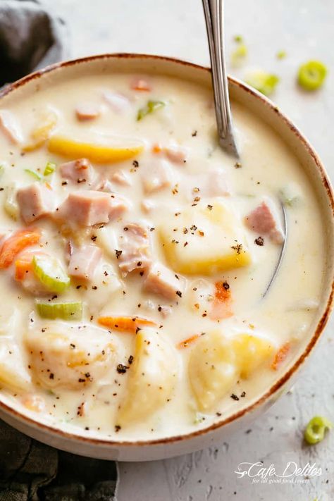 Deliciously creamy Ham and Potato Soup is easy to make and perfect to use up any leftovers! Filled with soft, tender potatoes, carrots, celery, onion, garlic and the option of making your own ham broth from a leftover ham bone! The best part? No heavy cream! Picky eaters will ask for seconds! | cafedelites.com Ham Soup Recipes, Ham Bone Soup, Best Potato Soup, Ham And Potato Soup, Ham Potato, Leftover Ham Recipes, Ham Bone, Creamy Potato Soup, Ham Soup