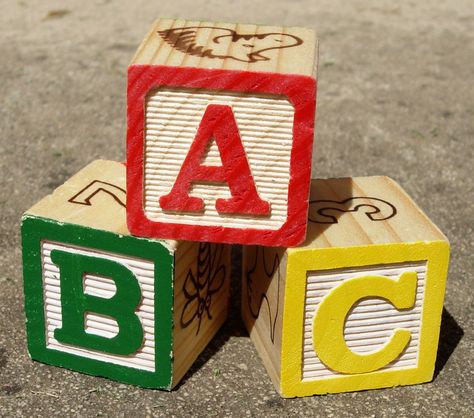 ABC Blocks Abc Block, Baby Development Milestones, Good Character Traits, Wooden Alphabet Blocks, Development Milestones, Abc Blocks, Block Play, Block Painting, Nonprofit Fundraising