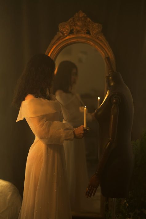 A woman in a white dress holding a candle in front of a mirror photo – Free Dress Image on Unsplash Poses With Mirror, Woman Holding Mirror, Woman Holding Candle, Candle Stairs, Holding Mirror, Mirror Pose, Holding Candle, Mirror Photography, Slavic Folklore