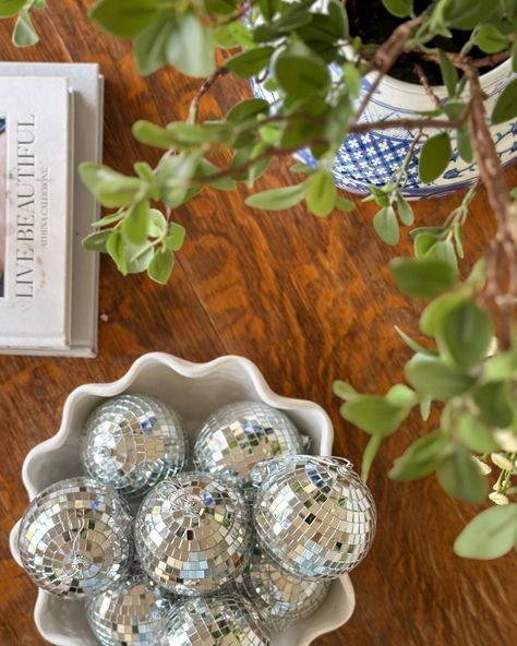 Disco balls make everything more fun! #fridaysareforphotos #roundroom #oldhouselove #housebeautiful #houseandhome #cljsquad #wearevivir #mydomaine #sodomino #myhomevibe #thespruce #mycrumbshome #homewithrue #smmakelifebeautiful Bowl Of Disco Balls, Coffee Table Styling, Disco Balls, Old House, More Fun, Beautiful Homes, Coffee Table, Bowl, Coffee