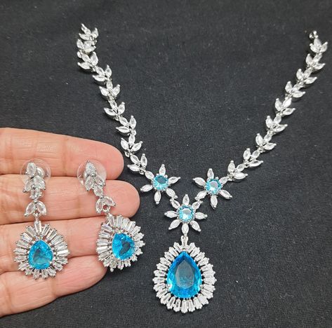 High quality American diamond necklace with earring in sky blue color WhatsApp for order 9650375040 https://www.instagram.com/tv/C5vBgQoOtNO/?igsh=amxycHBpZGd4YWxk Visit the profile for more articles Indian Wedding Jewelry Sets, American Diamond Necklaces, Sky Blue Color, Indian Wedding Jewelry, American Diamond, Wedding Jewelry Sets, Indian Wedding, Sky Blue, Jewelry Sets