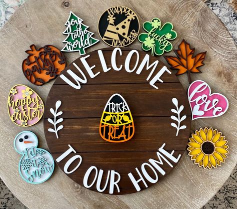 "*CHECK OUT OUR SHOP PAGE FOR MORE INTERCHANGEABLE SIGN OPTIONS* This is a beautifully hand crafted 18 inch \"Welcome to our home\" interchangeable 3D sign. Every piece is hand painted. Custom paint colors are available upon request. Each piece that is interchangeable is approximately 5x5 inches and 0.5 inches thick. The interchangeable pieces attach with magnets. This sign is not suitable for and is not guaranteed for outdoor use OR placed in direct sunlight. Can be fully customizable to your l Diy Changeable Wood Sign, Interchangeable Wood Sign, Welcome Signs For Front Door Interchangeable, Welcome Sign Front Door Changeable, Magnetic Welcome Sign, Welcome Sign With Changeable Seasons, Interchangeable Holiday Sign, Changeable Welcome Sign, Changeable Holiday Signs