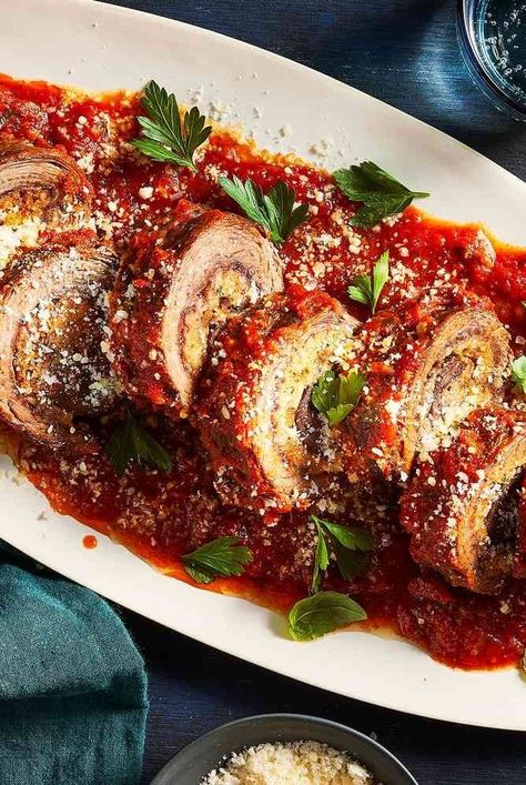 Braciole is rolled meat roulade that has been stuffed with breadcrumbs, cheese, pine nuts, and herbs. This recipe braises the braciole in a homemade tomato sauce until it’s meltingly tender. This is a perfect recipe for a family dinner. #dinnerideas#dinnerrecipes#dinnerdishes#familydinnerideas#supper#supperideas Rolled Meat, Braciole Recipe, Italian Main Dishes, Homemade Tomato Sauce, Italian Dinner, Italian Dishes, Pine Nuts, Tomato Sauce, Family Dinner