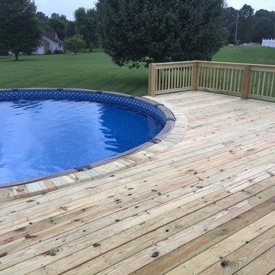 This deck was attached to the house and pre-existing deck. It went halfway around the pool. Round Pool Deck Ideas, Deck Bars, Deck Redo, Wooded Backyard, Curved Deck, Round Above Ground Pool, Above Ground Pool Deck, Pool Deck Plans, Pool Deck Ideas