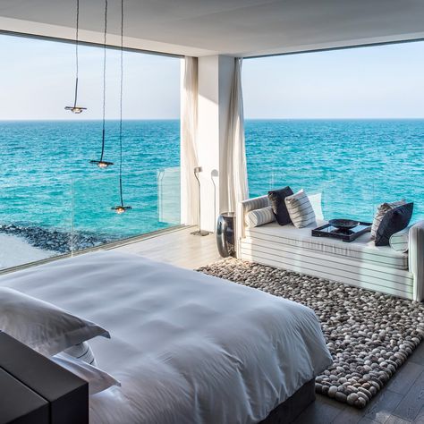 If your idea of a dream #bedroom is to wake up with the #ocean in sight, then this gorgeous overwater retreat at Zaya Nurai Island will make you never want to leave. Housed in one of the resort’s water villas, this contemporary, light-filled room makes the most of the magnificent sea views with glorious glass walls that seem to let the outside in. Interior Design Blogs, Luxury Beach House, Best Outdoor Furniture, Bedroom Views, Beach House Interior, Floor To Ceiling, Cabin In The Woods, Modern Bedroom Design, Floor To Ceiling Windows