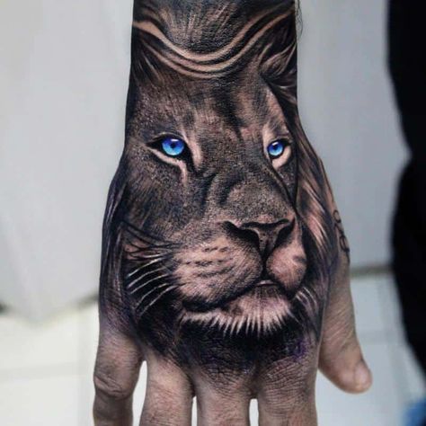 Blue Color Eyes Lion Tattoo 2 Lion Hand Tattoo Men, Roaring Lion Tattoo, Tiger Hand Tattoo, Lion Hand Tattoo, Herren Hand Tattoos, Lion Eyes, Mens Lion Tattoo, Lion Head Tattoos, Hand Tats