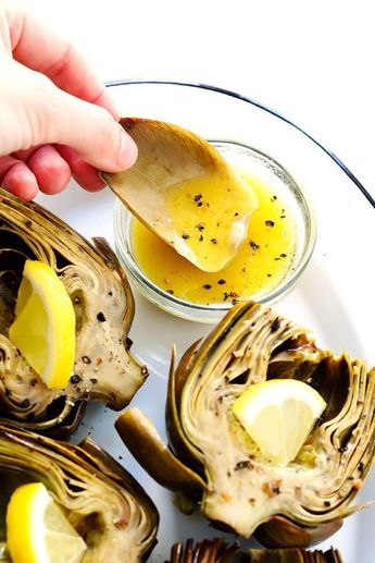 Seriously the most amazing roasted artichokes recipe! They're stuffed with lots of garlic and herbs, seasoned with lots of lemon and black pepper, and roasted to crispy, tender perfection. The perfect vegetable side dish! | Gimme Some Oven #artichokes #roasted #sidedish #vegetable #glutenfree #vegan Roasted Artichokes, Roasted Artichoke, Vegetable Side Dish, Gimme Some Oven, Good Roasts, Artichoke Recipes, Makanan Diet, God Mat, Vegetable Side