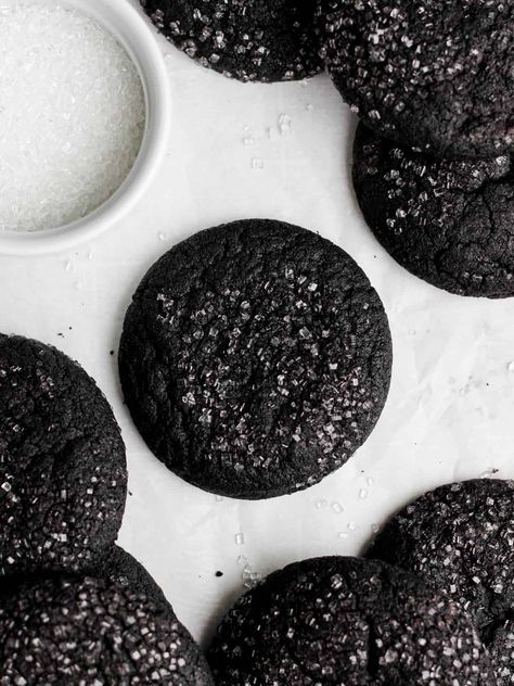 Overhead shot of black cocoa powder cookies, sitting against a white background and dusted in sanding sugar. Black Cocoa Powder Cookies, Black Cocoa Powder Recipes, Cookie Recipes Cocoa Powder, Black Cocoa Powder Buttercream, Black Cocoa Powder Cake, Powder Cookies, Black Cocoa Powder, Black Cocoa, Cocoa Powder Cookies