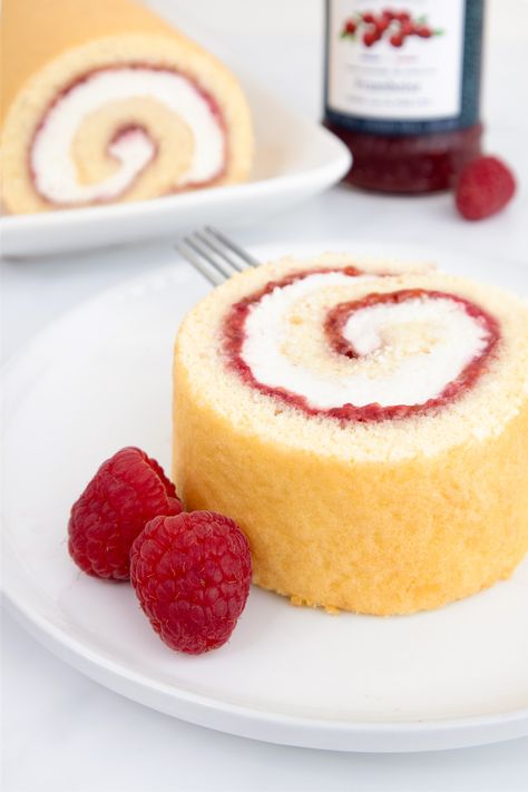 The Perfect Jelly Roll Cake (Gâteau Roulé) | Big Kitchen Dreams Jam Roll Recipe, Raspberry Jelly Roll Recipe, Roll Cake Filling, Cake With Jam Filling, Raspberry Cake Roll, Raspberry Zinger Cake, Jelly Roll Recipe, Jelly Recipes Desserts, Ice Cream Cake Roll