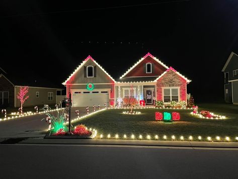 Outside Christmas Lights House Ideas, Christmas Light Design Outdoor, Red Green And White Christmas Lights On House, Outdoor Christmas Lights On Single Story House, Red And White Christmas Lights On House, Red White And Green Christmas Lights On House, Front Yard Christmas Lights, Christmas Colorful Lights Outdoor, Christmas Lawn Decorations Front Yards