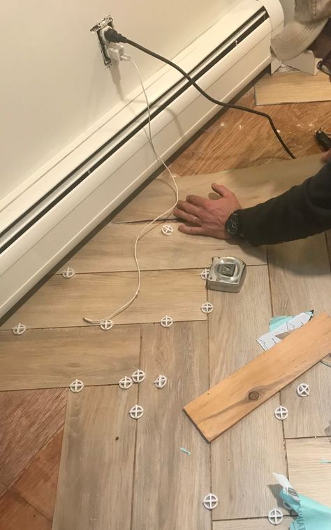 How to Install peel and stick tile in a herringbone pattern Peel And Stick Vynil Floor Tile, Diy Herringbone Floor, Tile Over Tile, Sticky Tile, Herringbone Tile Floors, Farmhouse Life, Floor Makeover, Baseboard Trim, Peel And Stick Wood