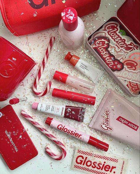 Christmas Skincare Aesthetic, Glossier Thermos, Christmas Self Care Aesthetic, Christmas Aesthetic Makeup, Christmas Lip Gloss, Winter Skincare Aesthetic, Glossier Cranberry, Christmas Makeup Aesthetic, Glossier Christmas