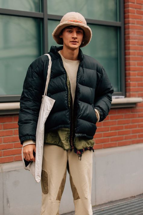 Check out all of the crossbody bags, puffer jackets, and swervy topcoats you can handle from the Fall/Winter 2018 shows in our exclusive street style gallery. Down Jacket Outfit, Best Puffer Jacket, Flying Man, Milan Fashion Week Men, Best Winter Jackets, Men Fashion Week, Fashion Week 2024, Mens Puffer Jacket, Winter Jacket Men