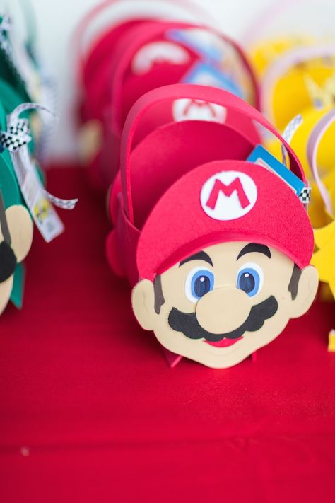 Mario Kart themed birthday party: The Treat Bags Mario Favor Bags, Mario Treat Bags, Super Mario Favors, Mario Kart Birthday Party, Mario Kart Birthday, Mario Themed Birthday Party, 1st Birthday Boy Themes, Mario Kart Party, Super Mario Bros Birthday Party