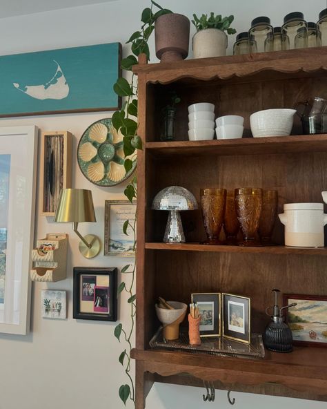 No wall is safe in this home 👀 spruced up the kitchen by adding some functional shelving, more art aaaaand the star of the show — @solariko.designs cordless rechargeable sconces 💡 #nycinteriordesign #homedecor #gallerywall #kitchendecor kitchen makeover, apartment inspo, interiors, renter friendly Decorating Deep Shelves, Nyc Interior Design, Dark Cabinets, Deep Shelves, Dark Kitchen Cabinets, Curated Vintage, Renter Friendly, Kitchen Makeover, Cozy House