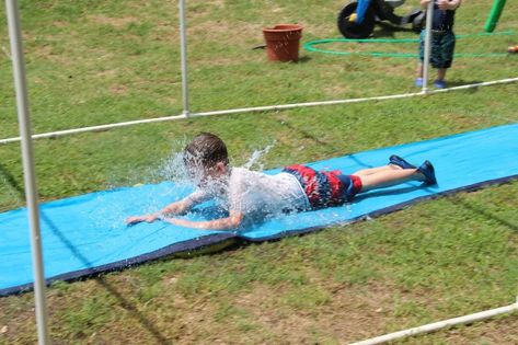 DIY Splash Pad for Summer Fun, Year After Year! Diy Splash Pad, Backyard Water Fun, Outdoor Table Centerpieces, Backyard Splash Pad, Summer Safety Tips, Diy Backyard Projects, Diy Mason Jar Lights, Seedling Pots, Most Popular Pins