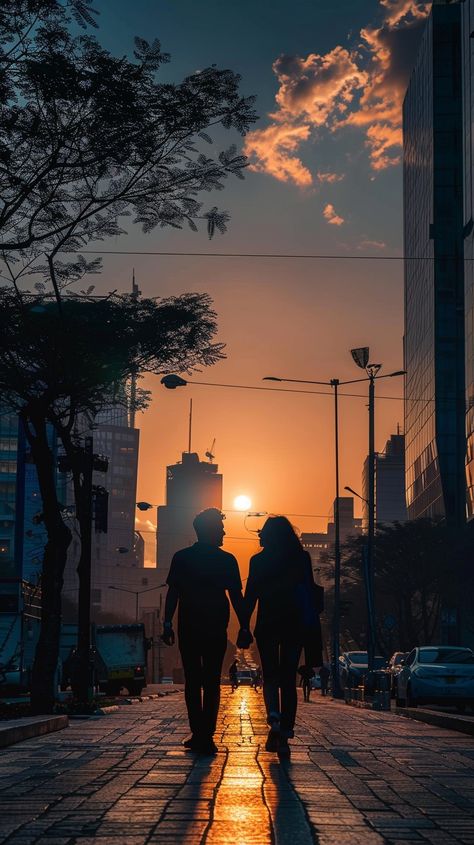 "Sunset City Walk: A couple walks hand in hand down a city sidewalk, silhouetted against the #sunset. #cityscape #couple #walking #silhouette #aiart #aiphoto #stockcake ⬇️ Download and 📝 Prompt 👉 https://stockcake.com/i/sunset-city-walk_531203_961860 #urbanlife #romanticwalk #eveningstroll #cityvibes #twilight #urbanromance #citysunset" Sun Set Couple Photos, Walking Silhouette, City Sidewalk, Sunset Cityscape, Couple Walking, Couple Silhouette, Couples Walking, The Setting Sun, Silhouette Photos