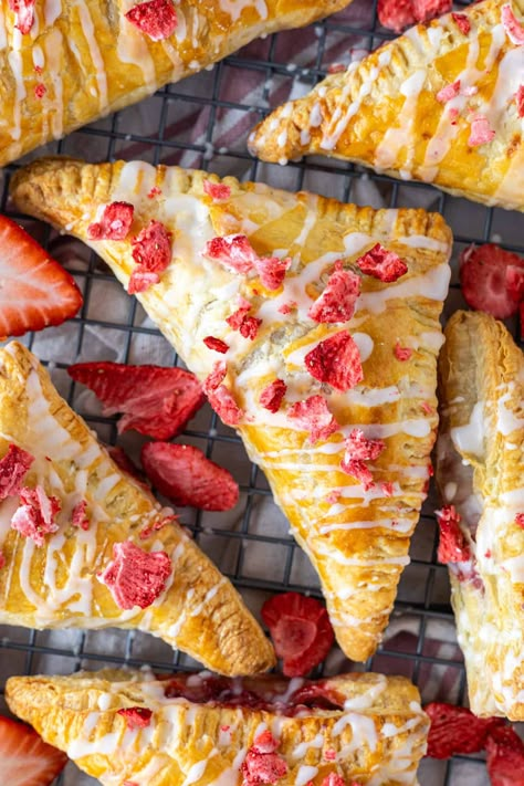 Easy Strawberry Turnovers with Puff Pastry – Sugary Logic Dessert Recipes Strawberry, Turnovers With Puff Pastry, Strawberry Turnovers, Easy Strawberry Dessert, Strawberry Sheet Cakes, Easy Strawberry Desserts, Frozen Yogurt Bites, Puff Pastry Crust, Turnover Recipes