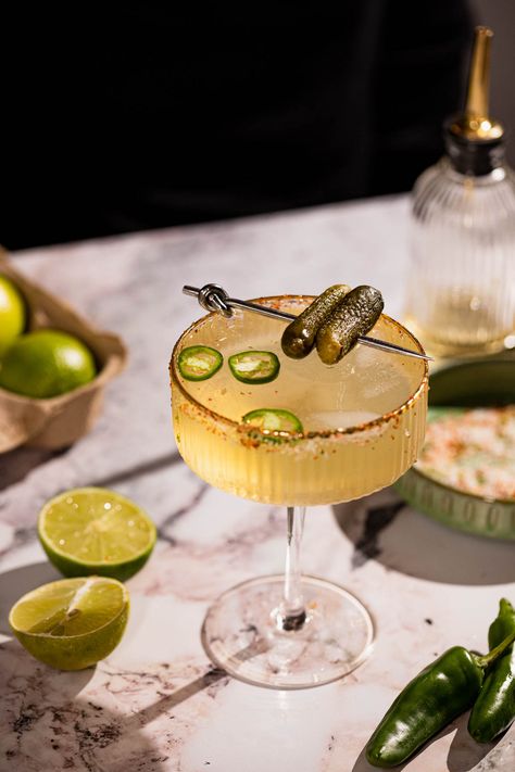 Pickle margarita with a twist: Our spin on the viral sensation. Briny, boozy, and unexpectedly delicious. Pickle Juice Cocktails, Pickle Martini Recipe, Pickle Margarita, Pickle Martini, Cocktail Recipes Tequila, Mezcal Margarita, Traditional Margarita, Cocktail Maker, Spicy Pickles