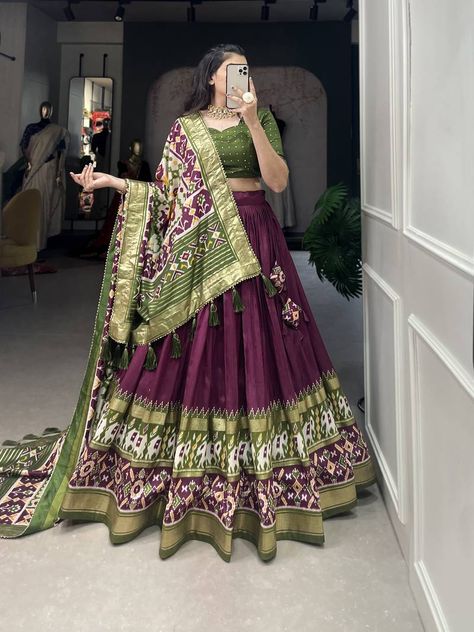 Yana Fab presents the epitome of elegance with our Wine Color Tussar Silk Lehenga Choli. Perfect for Navratri celebrations, this semi-stitched ensemble exudes charm with its circular wine-colored lehenga featuring intricate foilage print on luxurious Tussar Silk. Paired with a mehandi green blouse also crafted from Tussar Silk, and a multicolor Tussar Silk dupatta adorned with delicate Gotta Patti work. Complete your festive look with this stunning combination of tradition and style. Zip Stitching, Patola Print, डिजाइनर कपड़े, Heavy Lehenga, Indian Wedding Lehenga, Bridesmaid Lehenga, Choli Dress, Stitched Lehenga, Lehenga Designs Simple