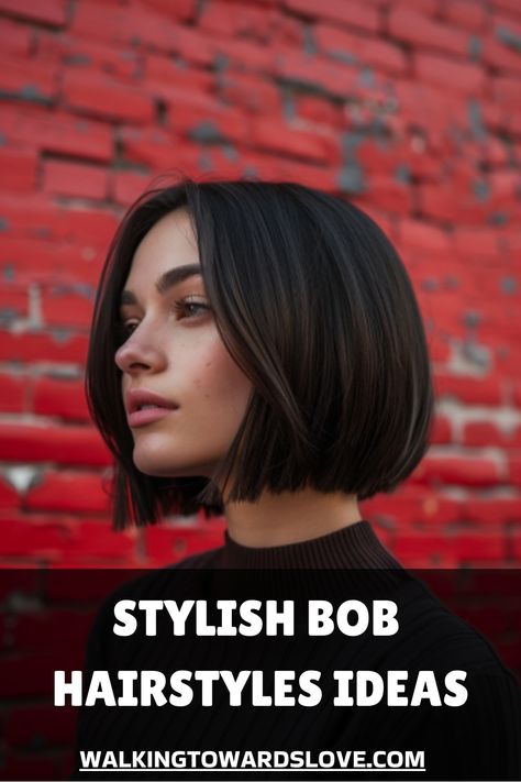 Woman with a sleek bob haircut against a red brick wall. Dark Bob Hairstyles, Bob Hairstyles Asian, Asymmetrical Bob Short Edgy, Short Sleek Bob, Flicked Bob, Sleek Bob Haircut, Bob Hairstyles Ideas, Bob Haircut Back View, Soft Blonde Highlights