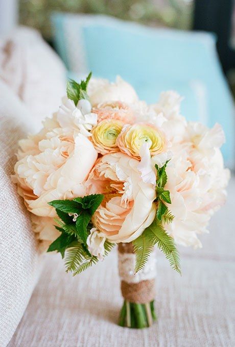 Peach peonies and ranunculus make this bouquet a spring bride's dream. Add bright greenery for a little extra color, like Out of the Garden, a South Carolina-based florist, did here. Ranunculus Bouquet, Wedding Flowers Peonies, Peach Peonies, Peony Bouquet Wedding, Bouquet Bride, Rustic Wedding Bouquet, Peony Wedding, Spring Wedding Flowers, Peonies Bouquet