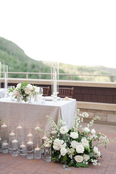 Candle Sweetheart Table, Head Table Wedding Flowers, Sweetheart Table Candles, Floral Hedge, Delphinium White, Glass Vase Wedding Centerpieces, White Hydrangea Centerpieces, White Delphinium, White Taper Candles