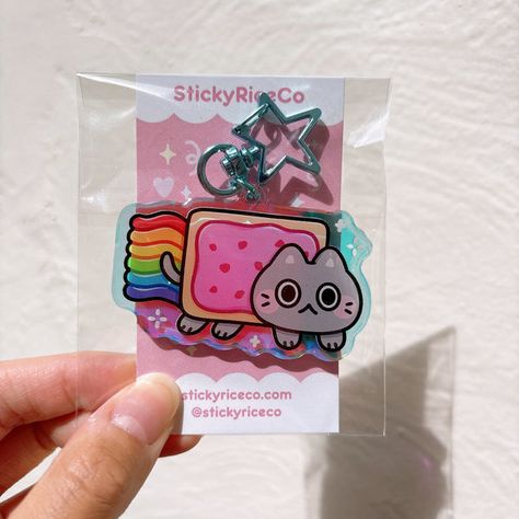 Pins To Put On Backpacks, Weirdcore Keychain, Silly Keychains, Silly Trinkets, Holographic Keychain, Rainbow Holographic, Backpack Pins, Nyan Cat, Acrylic Keychains