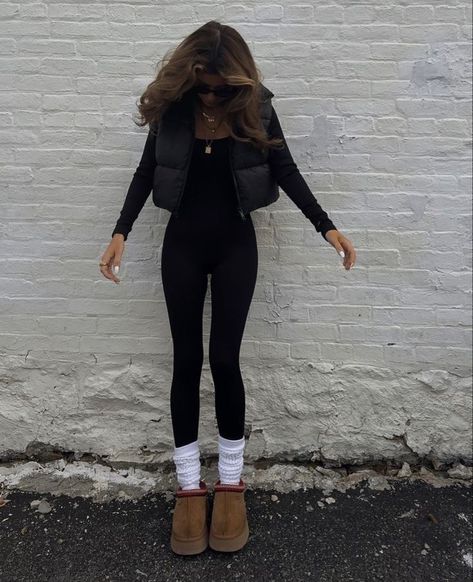 Apartment Touring Outfit, Black One Piece Outfit Casual, Autumn Leg Warmer Outfits, Jumpsuit With Leg Warmers, Uggs And Leg Warmers Outfits, Ugg Aesthetic Outfits, Leg Warmers Uggs, Leg Warmers Outfit Black Women, Long Leg Warmers Outfit