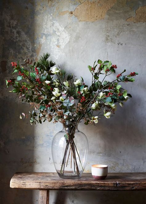 The Holly and Magnolia Bouquet | Neptune Holly Bouquet, Pruning Shrubs, Magnolia Bouquet, Magnolia Branch, Flower School, Flower Meanings, Welcome To Our Home, Round Vase, Simple Interior