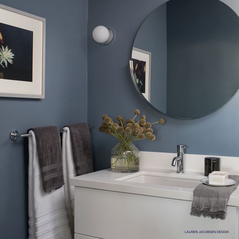 A rich dusty blue guest bath we recently created. Simple yet elegant with clean lines. I love that it feels a bit moody. The paint color is just what I wanted. 📷 : Meghan Beierle Stylist: Sunday Hendrickson #AZandLAdesigner #laurenjacobsendesign #bathrooms #moodyblues #interiordesign #interiors #interiorinspo #homedecor Gray Blue Bathroom Paint, 2023 Bathroom Wall Colors, Dusty Blue Powder Room, Dark Navy Bathroom Ideas, Dark Blue Bathroom Aesthetic, Blue Paint Bathroom Ideas, Blue White Grey Bathroom, Earthy Blue Bathroom, Blue Walls Bathroom Ideas