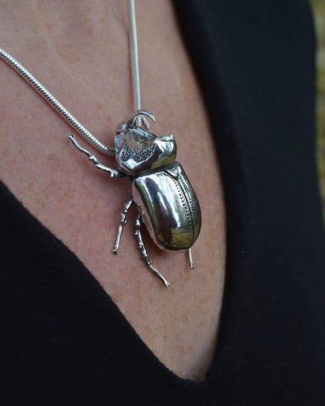 After a long struggle, my first rhinoceros beetle pendant is finally scuttling its way towards its new owner. #emmakeatingjewellery #animaljewellery #beetles #conceptohs Insect Jewelry Design, Rhinoceros Beetle, Beetle Necklace, Neutral Clothing, Indie Jewelry, Dope Jewelry, Funky Jewelry, Beetles, Animal Jewelry