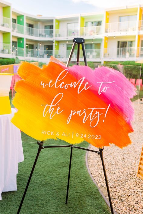 Our ombre acrylic welcome sign is the perfect way to wow your guests as they enter your wedding ceremony. This ombre wedding sign can be customized in any color scheme to fit every wedding theme from bright and bold to classic and elegant. ♥ DETAILS ♥ ✓ Lead times vary seasonally. Please check the current processing time on each listing. ✓ Rush order availability - please message us in advance! ✓ Choose your size and lettering color from the drop down menus. ✓ Other iridescent/color shifting pai Bright And Bold Party Theme, Wedding Sign Colorful, Colorful Wedding Centerpieces Bright, Wedding Bright Color Schemes, Colorful Seating Chart Wedding, Ombre Acrylic Sign, Bright Welcome Sign, Bright Color Wedding Theme, Wedding Nails With Glitter