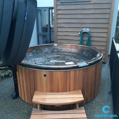 Hot Tub Hideaway, Garage Hot Tub Ideas, Small Hot Tub Ideas Backyard, Built In Hot Tub Ideas Backyard, Hot Tub Base Ideas, Round Hot Tub Surround Ideas, Circular Hot Tub, Circle Hot Tub, Hot Tub Wood Fired