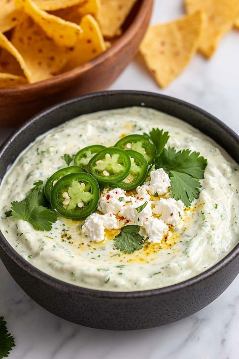 Looking for a delicious and creamy appetizer? Try this tangy greek yogurt jalapeno dip! The combination of smooth greek yogurt with spicy jalapenos creates the perfect balance of flavors. Whether you're hosting a party or just craving a flavorful snack, this dip is sure to be a hit. It's easy to make and pairs well with vegetables, chips, or crackers. Add some heat to your next gathering with this irresistible greek yogurt jalapeno dip! Yogurt Based Dips, Vegetables Chips, Best Greek Yogurt, Greek Yogurt Dip, Greek Yogurt Dips, Jalapeno Dip, Greek Yogurt Recipes, Lime Peel, Yogurt Dip