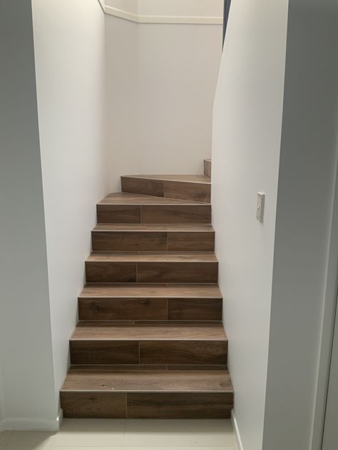 N-Tim K03 Timber Look Tile Installed by Dream Tiling Porcelain Wood Tile Stairs, Wood Look Tile Stairs, Wooden Stairs With Tiles, Wooden Tiles Staircase, Wood Tile Stairs, Internal Stairs, Topps Tiles Drift Wood Affect Tiles, Timber Tiles, Tile Stairs