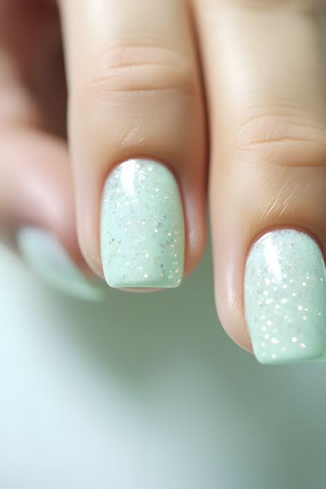 pastel mint nails, mint glitter nails, nail design, nail inspiration, trendy nails, pretty nails, nail ideas, nail goals, nail inspo, nail trends, nail art, nail goals, nail goals 2023, nail designs, nail aesthetics, nail styling, nail love, nail perfection, nail addict, nail obsession, nail magic, nail vibes, nail goals achieved, nail fashion, nail vibes, nail goals 2023 Light Green Nails With Glitter, Mint Glitter Nails, Pastel Mint Nails, Sea Green Nails, Getting Nails Done, New Year's Eve Nails, Cute Easy Nail Designs, Goals Achieved, Nail Aesthetics