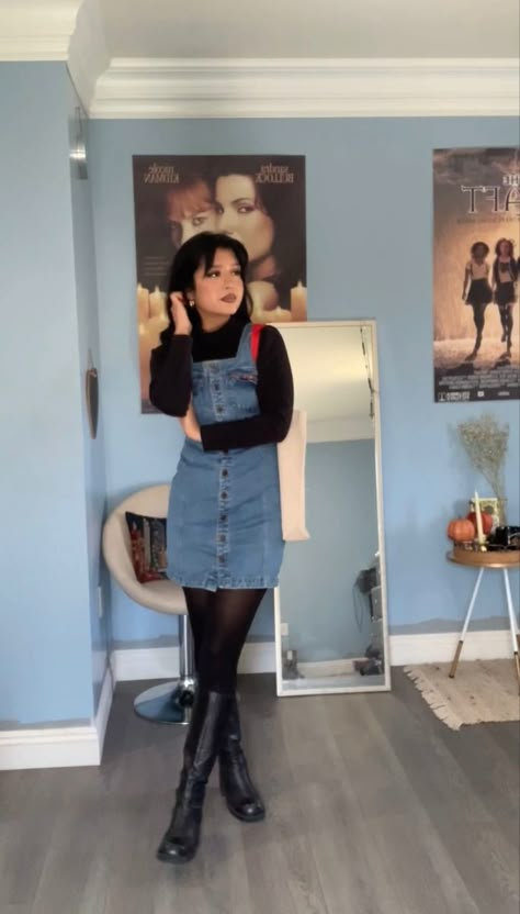 Skirt Overalls Outfit Fall, Denim Dress Black Tights, Overall Skirt Outfit Fall, 90s Jean Dress Outfit, 90s Teacher Fashion, Denim Mini Dress Outfit Winter, Denim Dress With Shirt Underneath, Jean Dress Fall Outfit, Short Denim Skirt Outfits Winter