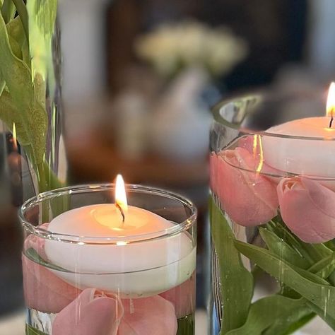 Jodie Kammerer on Instagram: "This floating candle spring centerpiece couldn’t be easier to make… or more beautiful! Comment TULIPS for the links!🌷 All you need are: 👍3 tall glass vases. 👍 Some real or faux tulips. 👍 And some floating candles! Happy Spring decorating! #thedesigntwins" Flowers In Floating Candles, Pretty Candles Floating, Tulip Candle Holders With Floating Candles, Vase With Flower And Floating Candle, Floating Candles With Purple Flowers, Faux Tulips, Tall Glass Vases, Chocolate Pairings, Floating Candle