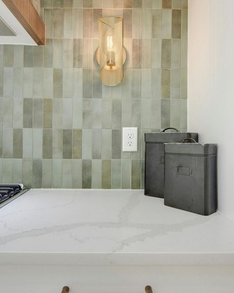 Bedrosians Tile | A vibrant kitchen backsplash brings life and energy to the space! Backsplash: Celine 2x6 in Sage Designed by @zaskiasimmonsdesign | Instagram Green Kitchen Backsplash, Master Bath Tile, Vibrant Kitchen, Green Backsplash, Bedrosians Tile, Sage Green Kitchen, Bath Tiles, Porcelain Floor, Green Tile