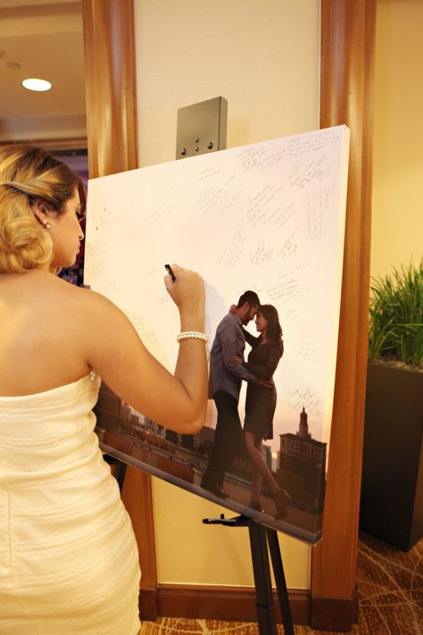 We made a canvas out of one of our engagement photos and provided sharpies for guests to sign. Wedding Wishes, Wedding Time, Here Comes The Bride, Wedding Guest Book, Fun Wedding, Wedding Bells, Country Wedding, Guest Book, Unique Weddings