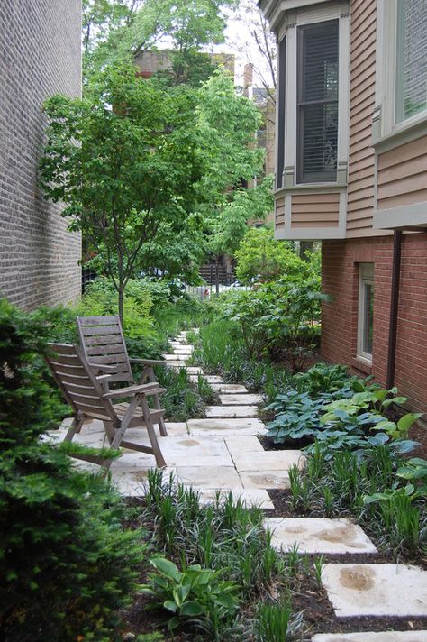 The sliver of land between two homes is easily forgotten, but becomes an outdoor oasis with a little landscaping and a few well-placed chairs. From Houzz   - ELLEDecor.com Side Yard Ideas, Concrete Stepping Stones, Side Yard Landscaping, Side Yards, Garden Stepping Stones, Small Backyard Gardens, Side Garden, Have Inspiration, Traditional Landscape