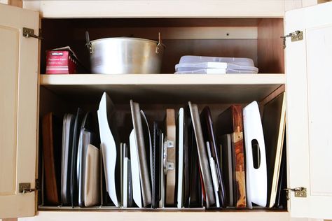 Organized kitchen storage cabinets! This is a really easy, great way to store store pots, pans, and lids. This pot rack has a place for every piece and it’s easy to put things back where they belong! One of the best kitchen cabinet organizers I've seen. #kitchen #storage #cabinets #organizers #pots #pans Pots And Pans Organization, Pans Organization, Organizing Cabinets, Drawers Ideas, Clever Kitchen Storage, Pot And Pans Organization, Pan Storage, Pan Organization, Tension Rods