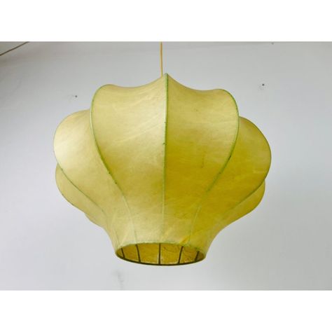 A cocoon pendant lamp made in Italy in the 1960s. The hanging lamp has been manufactured in the design of the lamps made by Achille Castiglioni. The lamp shade is of original cocoon and has an flower shape.   Measures:  Height: 36-72 cm Diameter: 42 cm  The light requires one E27 light bulb. Works with both 120/220V. Very good vintage condition.  Free worldwide express shipping.Continue Reading Hallway Pendant Lighting, 1960s Italy, How To Make A Chandelier, Retro Chandelier, Large Hallway, Achille Castiglioni, Under The Tuscan Sun, Lighting Concepts, Wooden Lamp