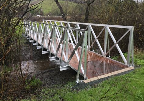 Trail Bridge Kits | ATV Bridges | RollingBarge.com Atv Bridge Over Creek, Atv Bridge, Diy Bridge, Stone House Revival, Cable Bridge, Backyard Bridges, Outdoor Bridges, Bridge Ideas, Build A Bridge