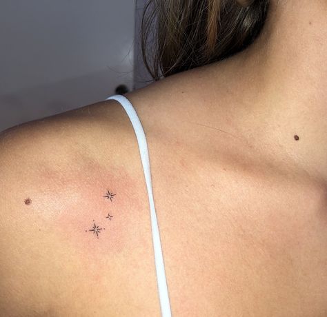 Done by @theghostkat. #tinytattoos #sparklestattoo #startattoos #thinlinetattoo Random Aesthetic Tattoos, Small Parisian Tattoos, Stick And Poke Tattoo Sparkle, Star Related Tattoos, Sparkles Tattoo Ideas, Small Sparkle Tattoo Ideas, Feminine Dainty Tattoos, Tiny Sparkle Tattoo, Two Lines Tattoo