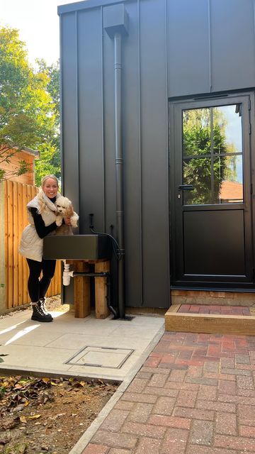 Emily Norris on Instagram: "Just me and my bestie getting back from a walk and using her new outdoor dog shower 🐶 🚿 (Okay she wasn’t actually muddy today but I really wanted to show you guys!) Our renovation plans started way before we decided to get a puppy. But we still managed to incorporate a space perfect for Kiki. We decided to have a butler sink raised at our back door with a warm water feed to make it easy to clean the dog when getting back from a muddy walk. We had quite a lot of Emily Norris, Dog Shower Outdoor, Outdoor Dog Shower Ideas, Outside Sink, Butler Sink, Outdoor Sinks, Getting A Puppy, Dog Shower, Outdoor Boots