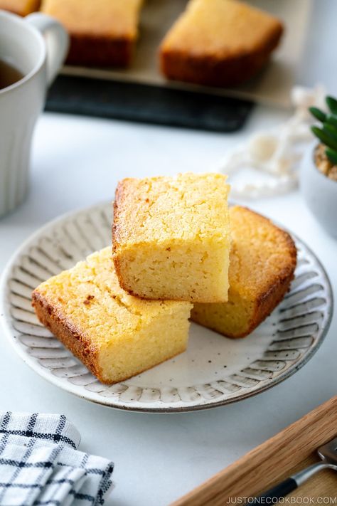 Bring home a taste of Hawaii with this oh-so-delicious Butter Mochi! Made with coconut milk and mochiko (glutinous rice flour), this classic Hawaiian sweet treat will have everyone drooling. You'll love the chewy, buttery texture and tropical flavor of this dessert that's part Japanese mochi and part local coconut cake. It's so simple to make and perfect for your next potluck party or family get-together. #buttermochi #mochi | Easy Japanese Recipes at JustOneCookbook.com Mochiko Cake Recipe, Butter Coconut Mochi, Matcha Butter Mochi, Glutinous Rice Cake Recipe, Japanese Mochi, Butter Mochi, Rice Cake Recipes, Mochi Cake, Easy Japanese Recipes